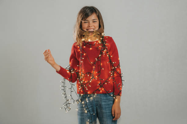 istock Girl wearing a Christmas hat 1317749819