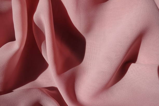 istock Crumpled simple thin pastel pink chiffon fabric 1317751538