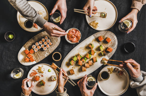 istock Friends quarantine Japanese sushi dinner from delivery service 1317751813