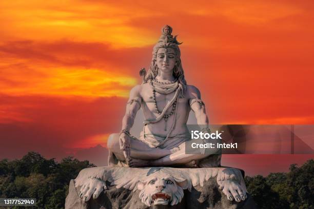 Statue Of Meditating Hindu God Shiva On The Ganges River At Rishikesh Village In India Stock Photo - Download Image Now
