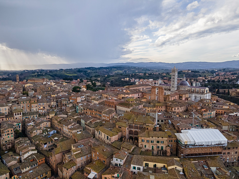 Siena, Italy - January 25, 2021: Aerial view of the historical district of Siena, the most famous medieval city in Italy