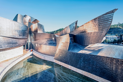 Bilbao, Spain, October 18, 2023 - Bilbao Guggenheim Museum seen from Avenida Abandoibarra, Spain.