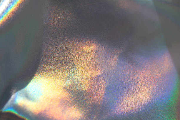 istock Holographic rainbow iridescent wrinkled background. Abstract and blurred backdrop 1317757965