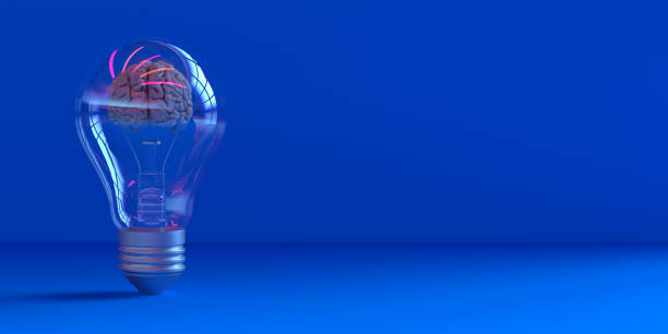 istock Glowing brain in a light-bulb on blue background with space for texting 1317759035