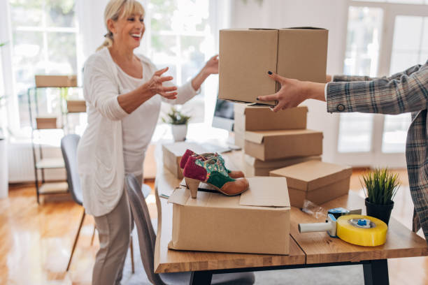 istock Women arranging orders for customers 1317759153