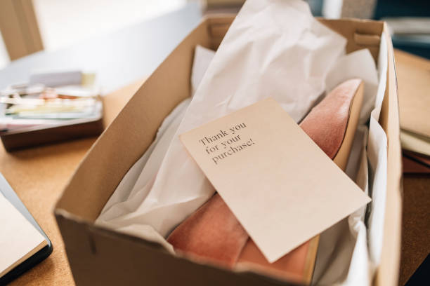 istock Open Box with Shoes Prepared to Be Sent 1317759309