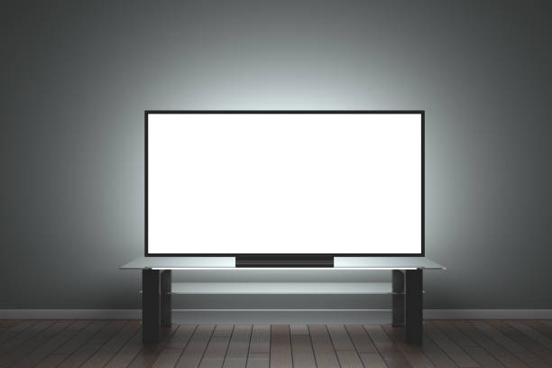 istock Mockup TV. Large LCD TV in a dark room on a glass table. 3d rendering. 1317759650