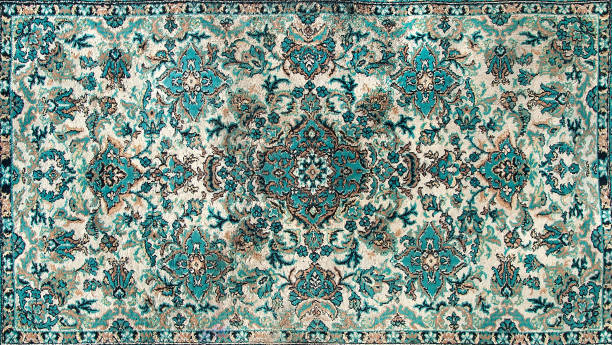 a textura de um tapete persa, um ornamento abstrato. padrão de mandala redonda, textura tradicional de tecido de tapete do oriente médio. azulão verde leitoso bege, verde claro, marrom. motivos vintage, orientais - persian culture - fotografias e filmes do acervo