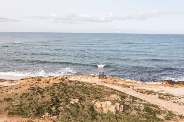 istock Drone view of bikers on the coastline 1317767056