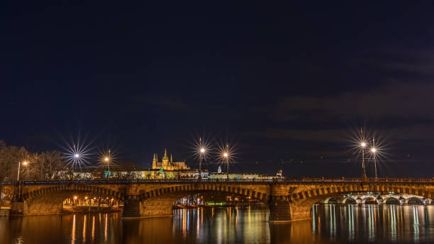 istock Night shot of Prague with Vltava river 1317769463