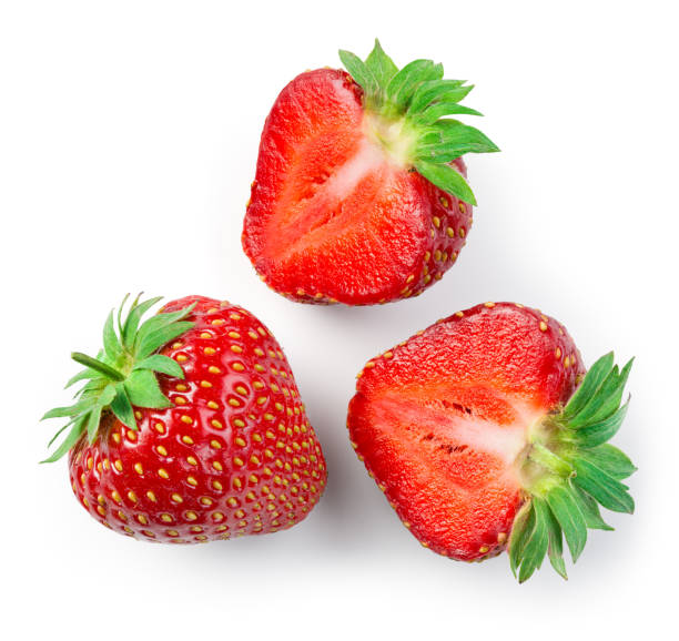 istock Strawberries isolated. Strawberry half and whole berry with leaf isolate. Three strawberries on white. Top view. 1317771154