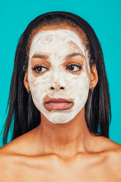 istock Young mixed race woman with face mask 1317772154
