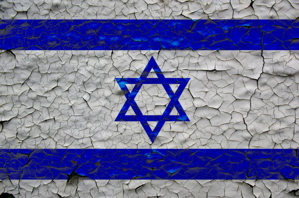 istock israel flags painted over cracked concrete wall 1317775130