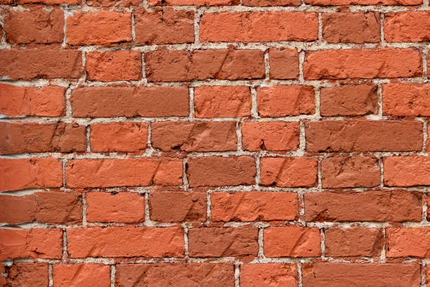 istock Texture of an old damaged brick wall 1317779223