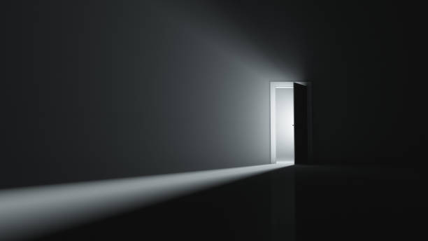 A slightly open door to a room with bright light. Copy space. A slightly open door to a room with bright light. Copy space. ajar stock pictures, royalty-free photos & images