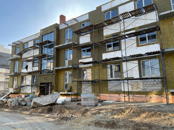 istock process of building real estate apartment, industrial construction site 1317785543