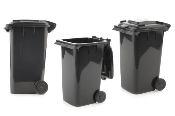 Black garbage cans Black garbage cans isolated on white background industrial garbage bin photos stock pictures, royalty-free photos & images