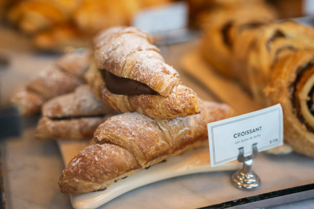istock Fresh croissant displayed for sale in bakery 1317787911