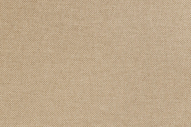 istock Brown cotton fabric texture background, seamless pattern of natural textile. 1317788898