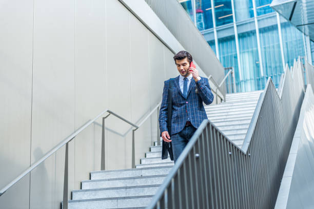 istock Businessman leaves an office building 1317791811