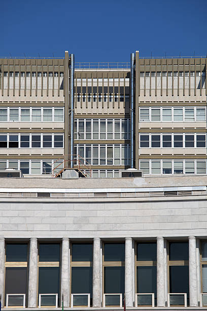 istock Office building in Rome against a light blue sky 131779421