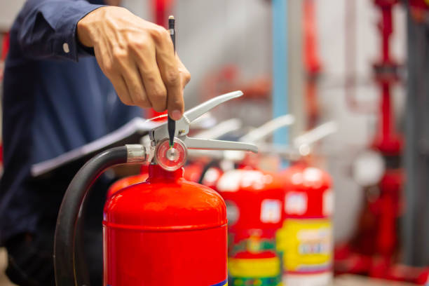 Engineer checking Industrial fire control system, Fire Alarm controller, Fire notifier , Anti fire. System ready In the event of a fire. Engineer checking Industrial fire control system, Fire Alarm controller, Fire notifier , Anti fire. System ready In the event of a fire. Notifier stock pictures, royalty-free photos & images