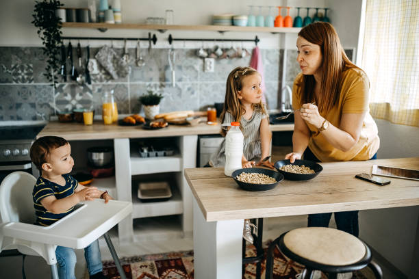 istock Mother and children prepare breakfast 1317796464