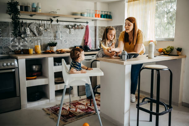 istock Mother and children prepare breakfast 1317796623