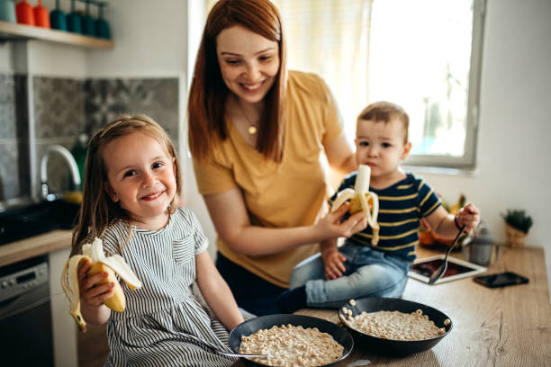 istock Family gathered in the kitchen 1317796857