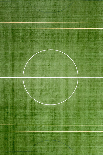 Drone View Of Street Soccer Court. Outdoor sport ground with green surface for playing football or soccer