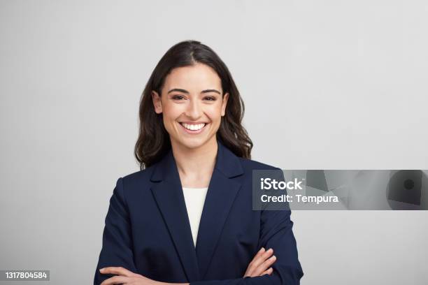 One Businesswoman Studio Portrait Looking At The Camera Stock Photo - Download Image Now