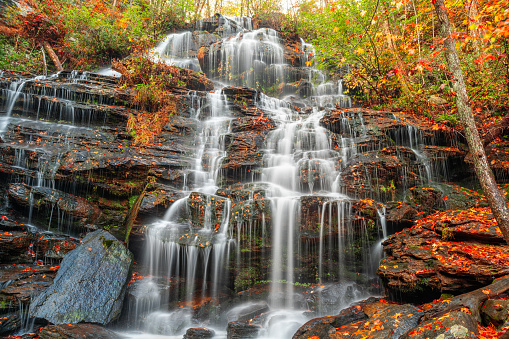 Issaqueena Falls during autumn season in Walhalla, South Carolina, USA.
