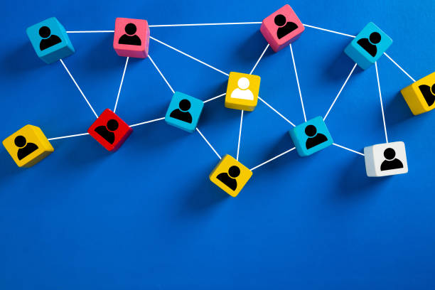 istock Wooden cube block print screen person icon which link connection network for organisation structure social network and teamwork concept. 1317806385