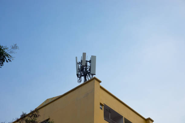 istock 4g antennas on condominium in Bangkok 1317807563