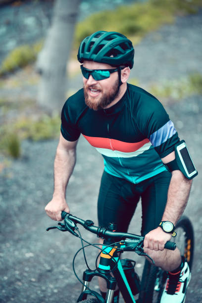 istock Smiling Male Cyclist Enjoying His Favorite Hobby 1317811607