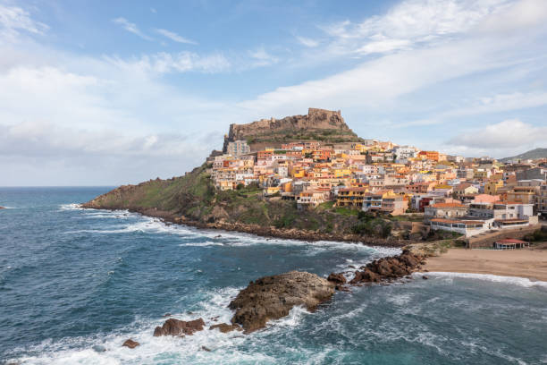 Drone view of Castelsardo town in Sardinia View of blue clear beach and coast in Sardinia, Italy castelsardo photos stock pictures, royalty-free photos & images