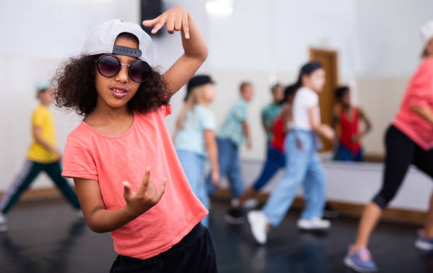istock Afro girl hip hop dancer performing at class 1317812175