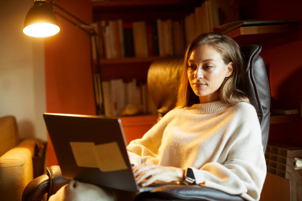 istock A woman working on her personal finances at the home studio. 1317814278