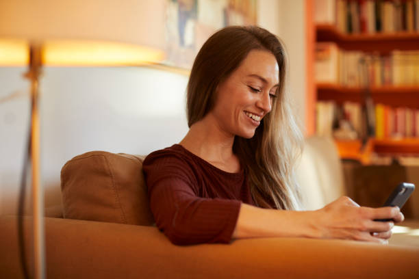 istock A woman working looking at her personal finances on an app. 1317814309