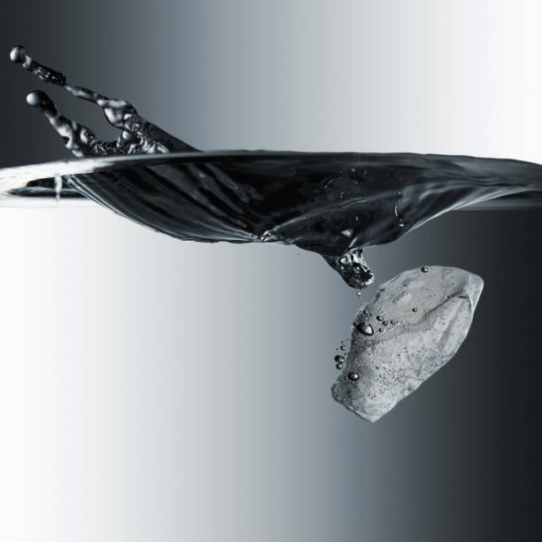 istock Ice pieces drops into the water. 1317814487
