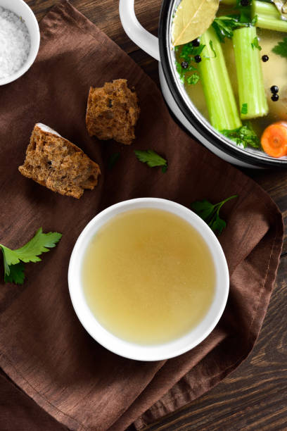 istock Chicken broth with vegetables and spices 1317814617