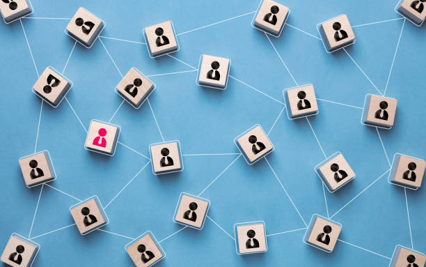 istock Teamwork, network, social connection and community concept. cubes with people symbols and connections between them. 1317816246