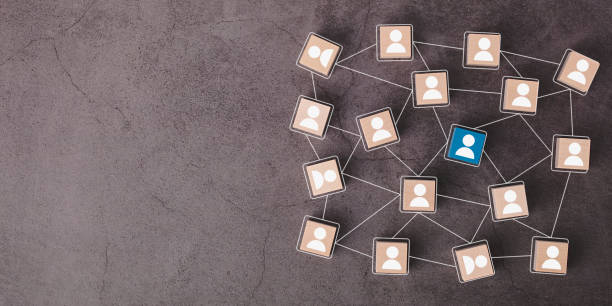 istock Teamwork, network, social connection and community concept. cubes with people symbols and connections between them. 1317816865