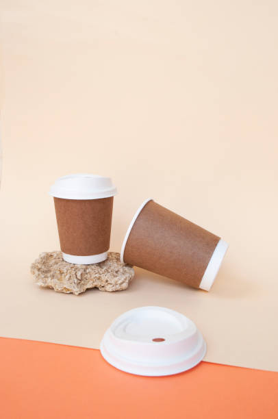 istock Bidegradable paper brown coffee cups with biodegradable white lids. 1317818484