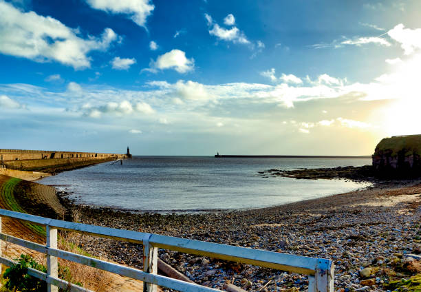 A cove on the River Tyne looking towards the piers at north and South Shields at the mouth of the river.