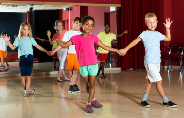 istock Fine children trying dancing partner dance 1317826223
