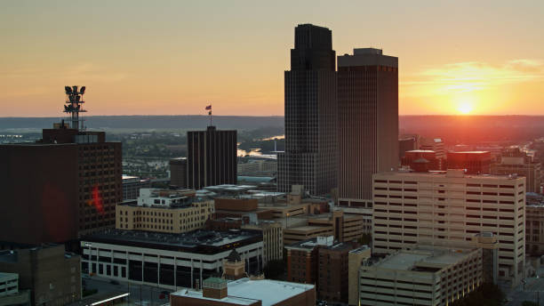 istock Sun Rising Behind Office Towers in Downtown Omaha 1317827595