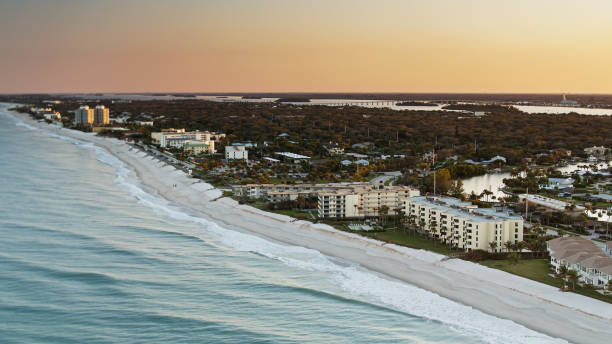 Drone shot of Vero Beach, a small city on the Indian River Lagoon in Indian River County, Florida at sunset.