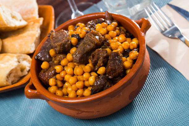 istock Stewed beef with chickpea in clay bowl 1317831999