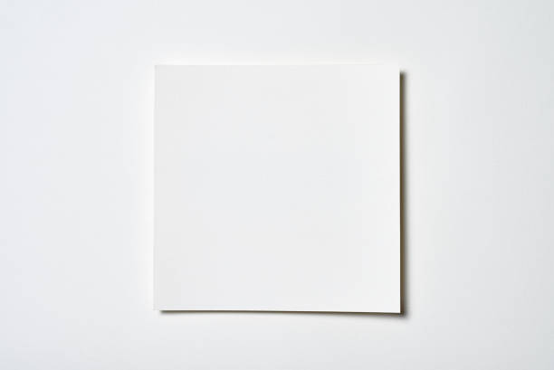 istock White paper background, copy space. Top view, flat lay, above 1317834633
